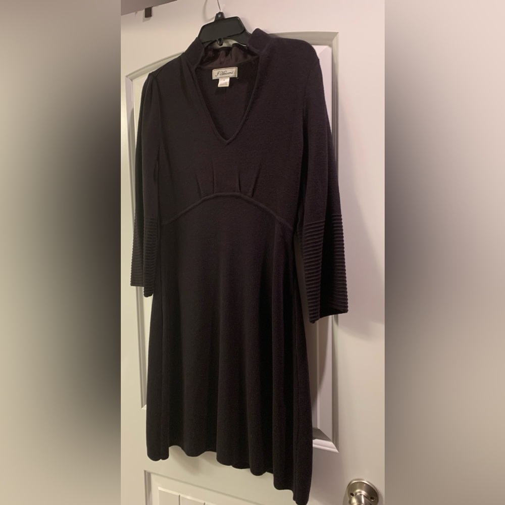 Worn gently, lovely flow, nice with boots and tights. I really like this dress.